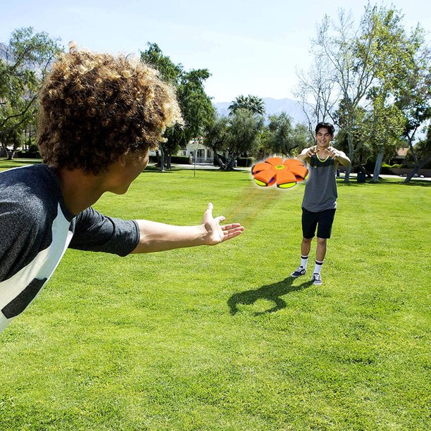 boys throwing frisbee